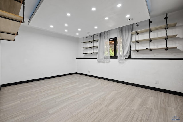1215 Range View Cir, Rapid City, SD 57701 - unfurnished room with recessed lighting, baseboards, and wood finished floors