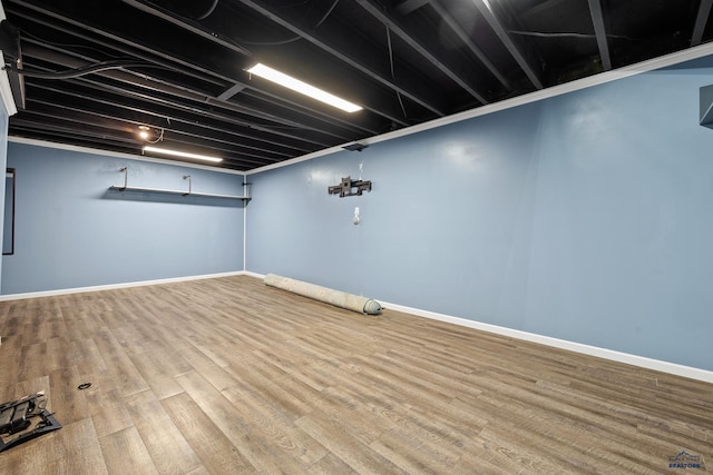 1215 Range View Cir, Rapid City, SD 57701 - finished below grade area featuring wood finished floors and baseboards