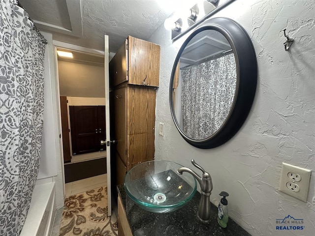 414 2nd Ave, Edgemont, SD 57735 - bathroom featuring a shower with curtain, a sink, and a tub
