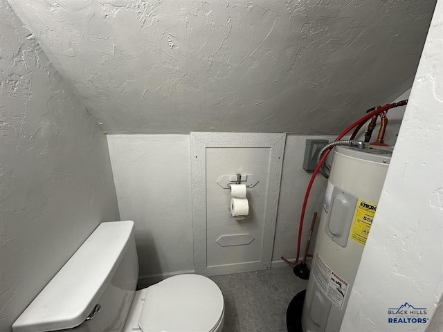 414 2nd Ave, Edgemont, SD 57735 - bathroom with water heater, toilet, lofted ceiling, a textured ceiling, and a textured wall