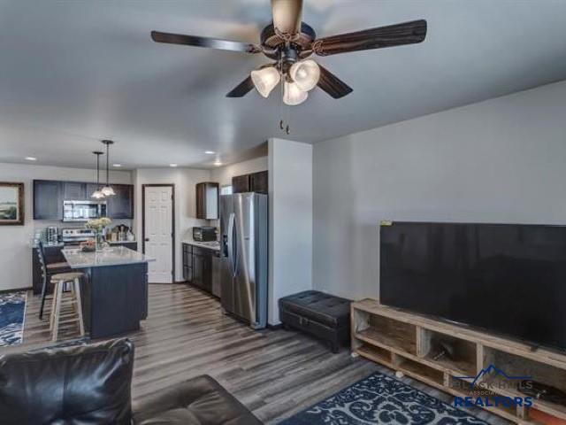 2331 E Philadelphia, Rapid City, SD 57701 - living area featuring dark wood-style flooring, ceiling fan, and recessed lighting