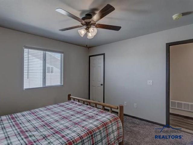 2331 E Philadelphia, Rapid City, SD 57701 - bedroom with baseboards, a ceiling fan, and carpet flooring