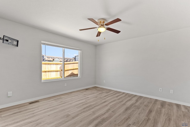 416 Henry Potter Rd, Box Elder, SD 57719 - unfurnished room featuring a ceiling fan, light wood-style flooring, and baseboards