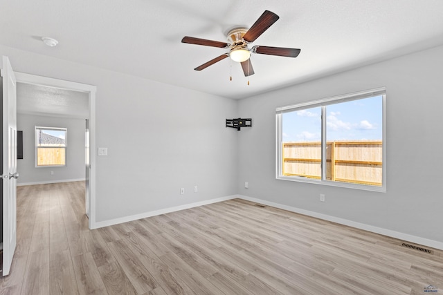 416 Henry Potter Rd, Box Elder, SD 57719 - empty room with a ceiling fan, light wood-type flooring, baseboards, and a smoke detector