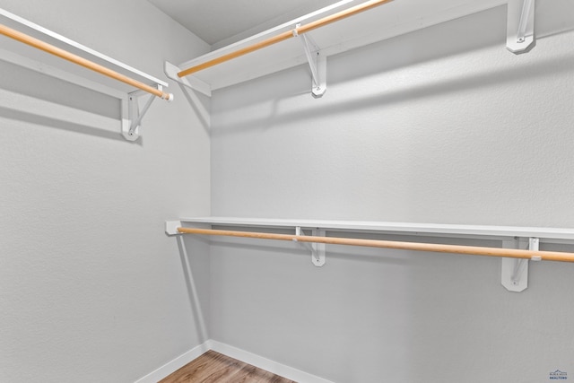 416 Henry Potter Rd, Box Elder, SD 57719 - walk in closet with wood finished floors