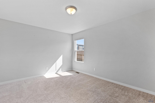416 Henry Potter Rd, Box Elder, SD 57719 - carpeted empty room with baseboards