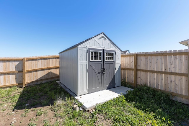 416 Henry Potter Rd, Box Elder, SD 57719 - view of shed with a fenced backyard