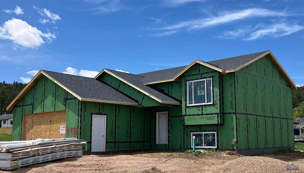 3483 Joseph St, Sturgis, SD 57785 - view of front of property with board and batten siding and roof with shingles