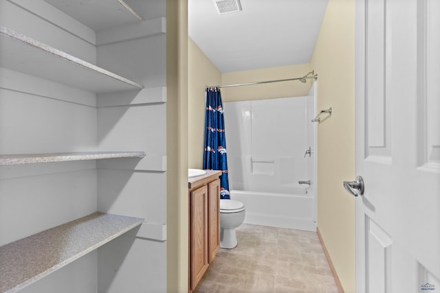 4300 Donegal Way, Rapid City, SD 57702 - full bathroom with toilet, shower / bath combo with shower curtain, vanity, and baseboards