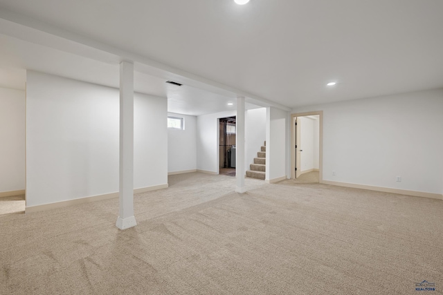 248 S 10th St, Custer, SD 57730 - below grade area featuring light carpet, stairway, recessed lighting, and baseboards