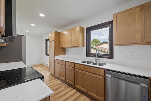 248 S 10th St, Custer, SD 57730 - kitchen with appliances with stainless steel finishes, a sink, light wood-style flooring, recessed lighting, and a baseboard radiator