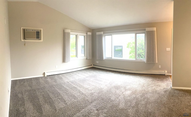 305 S Canyon Rd Unit 8D, Rapid City, SD 57702 - carpeted spare room with a wall unit AC, a baseboard radiator, lofted ceiling, and baseboards