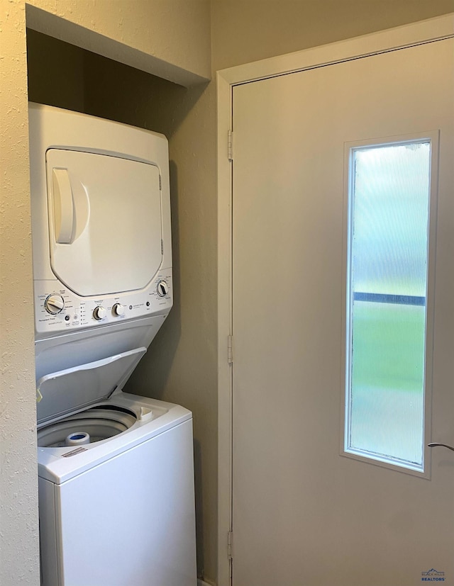 305 S Canyon Rd Unit 8D, Rapid City, SD 57702 - laundry area featuring stacked washer / drying machine
