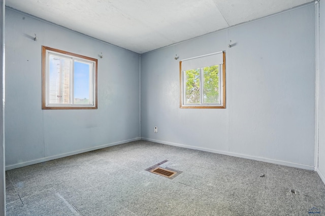 1905 5th St, Rapid City, SD 57701 - empty room featuring carpet floors and baseboards