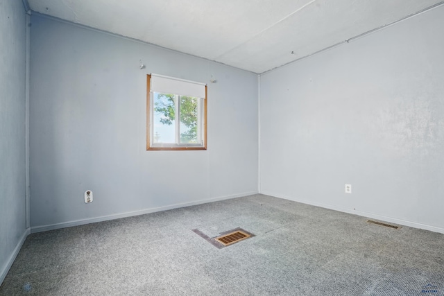 1905 5th St, Rapid City, SD 57701 - spare room featuring carpet flooring and baseboards