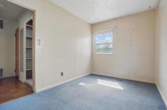 1905 5th St, Rapid City, SD 57701 - carpeted spare room featuring baseboards