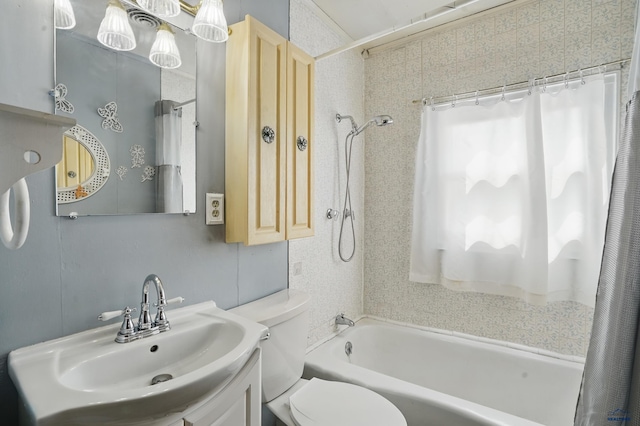 1905 5th St, Rapid City, SD 57701 - bathroom featuring shower / bath combination with curtain, toilet, and vanity
