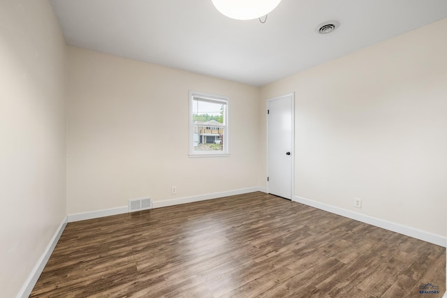 814 Flormann, Rapid City, SD 57701 - unfurnished room featuring wood finished floors and baseboards
