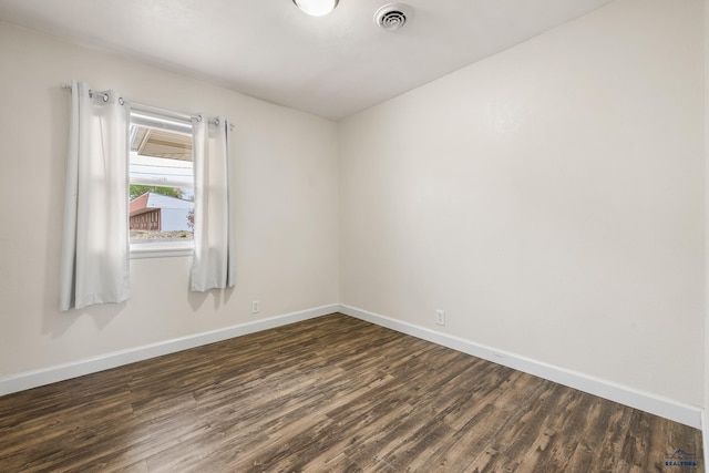 814 Flormann, Rapid City, SD 57701 - unfurnished room with dark wood-type flooring and baseboards