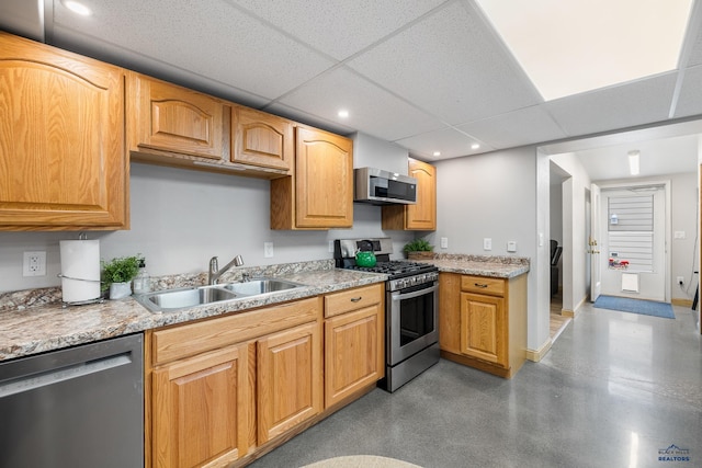 814 Flormann, Rapid City, SD 57701 - kitchen with stainless steel appliances, a sink, recessed lighting, concrete flooring, and a drop ceiling