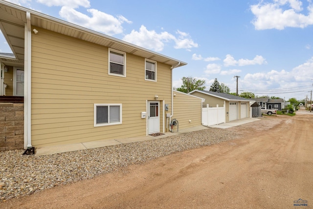 814 Flormann, Rapid City, SD 57701 - rear view of house featuring a detached garage