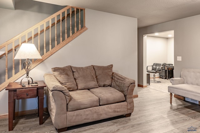 7410 Pinewood Ct, Rapid City, SD 57702 - living room with wood finished floors and stairway