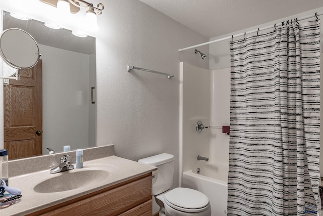 7410 Pinewood Ct, Rapid City, SD 57702 - bathroom with shower / tub combo with curtain, vanity, toilet, and a textured wall