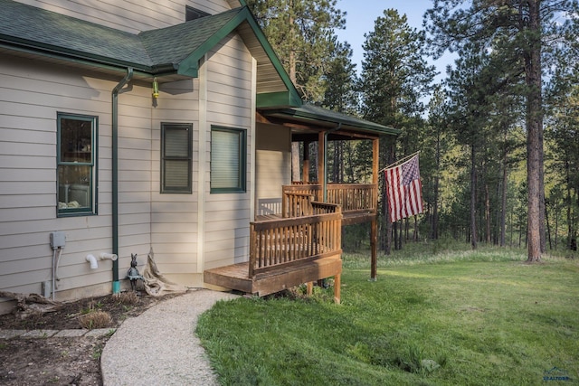 7410 Pinewood Ct, Rapid City, SD 57702 - view of green lawn featuring a wooden deck