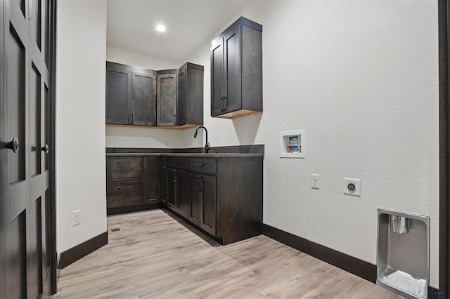 12290 Prairie View Loop, Whitewood, SD 57793 - washroom with hookup for an electric dryer, cabinet space, washer hookup, baseboards, and light wood finished floors