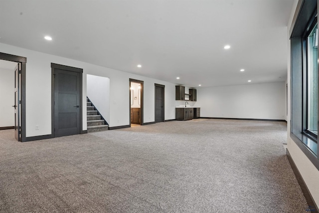 12290 Prairie View Loop, Whitewood, SD 57793 - basement with light carpet, recessed lighting, baseboards, and stairway