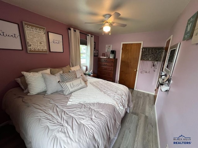 2104 Colorado, Sturgis, SD 57785 - bedroom featuring wood finished floors, ceiling fan, and baseboards