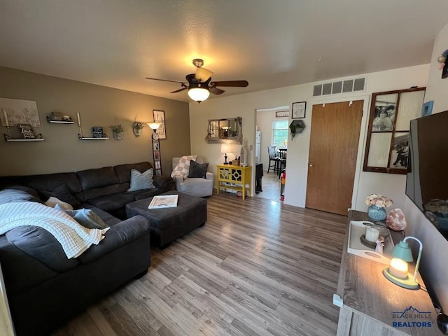 2104 Colorado, Sturgis, SD 57785 - living room with wood finished floors and a ceiling fan