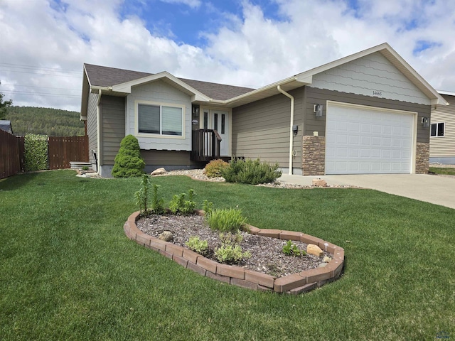 14655 Telluride St, Summerset, SD 57769 - ranch-style home featuring an attached garage, driveway, and roof with shingles