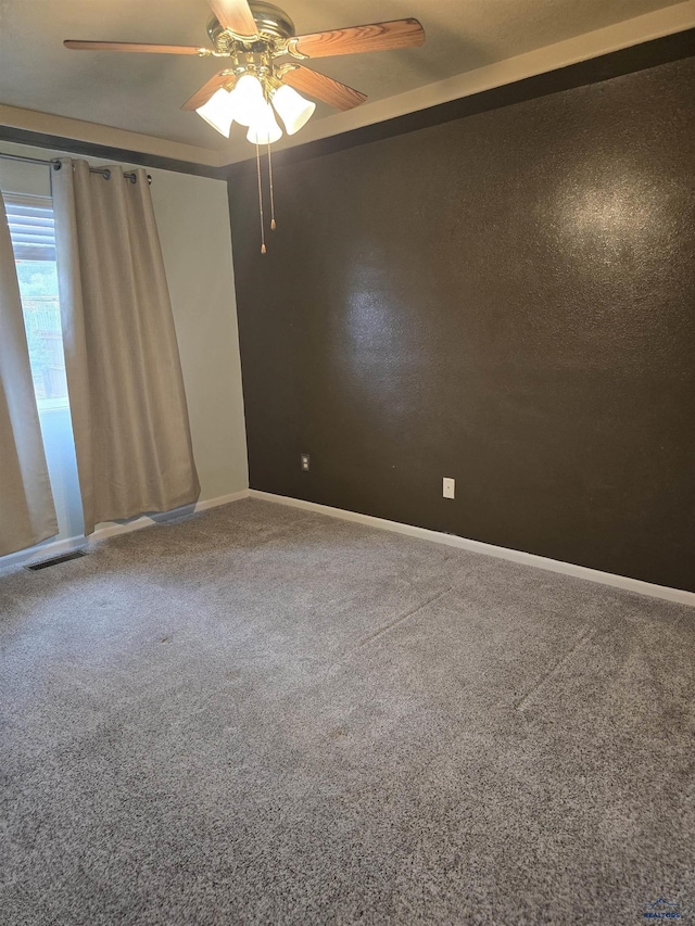 14655 Telluride St, Summerset, SD 57769 - spare room featuring ceiling fan, carpet, and baseboards
