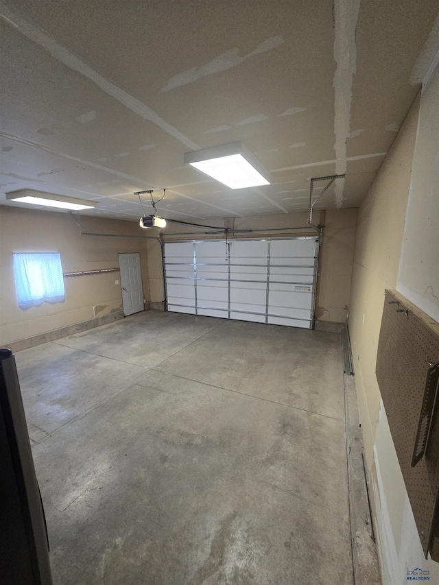 14655 Telluride St, Summerset, SD 57769 - garage featuring a garage door opener