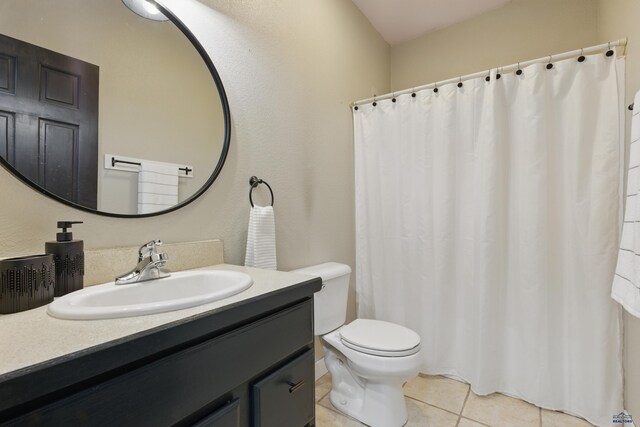 7155 Mulberry Dr, Summerset, SD 57718 - bathroom featuring toilet, vanity, tile patterned floors, and a shower with curtain