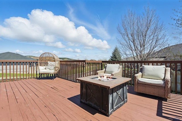 7155 Mulberry Dr, Summerset, SD 57718 - wooden terrace featuring an outdoor fire pit