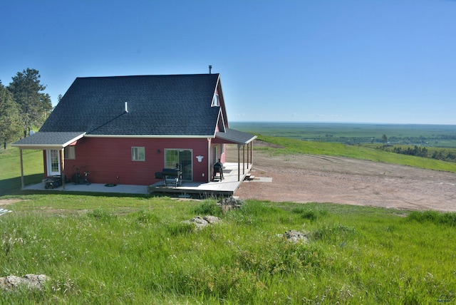 14450 Edgewood Pl, Piedmont, SD 57769 - back of house with a shingled roof and a deck