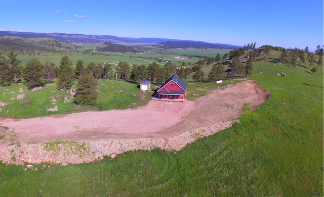14450 Edgewood Pl, Piedmont, SD 57769 - aerial view of property and surrounding area with a mountain backdrop and rural landscape