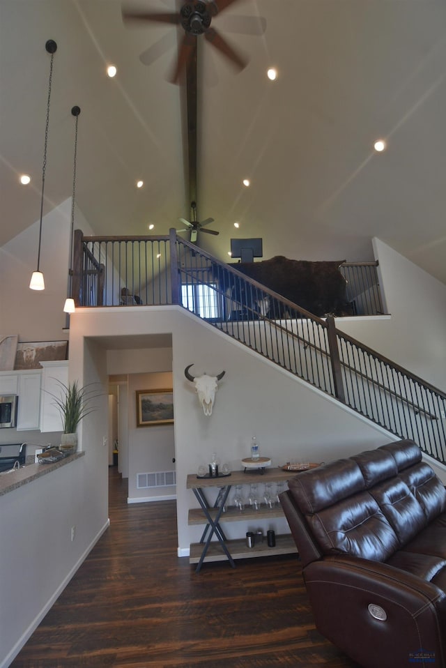 14450 Edgewood Pl, Piedmont, SD 57769 - living room featuring ceiling fan, high vaulted ceiling, wood finished floors, baseboards, and beamed ceiling