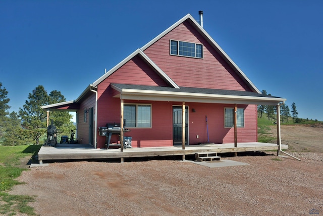 14450 Edgewood Pl, Piedmont, SD 57769 - back of property with a wooden deck