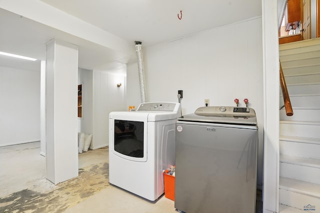 701 Hustead St, Wall, SD 57790 - laundry room with washer and clothes dryer