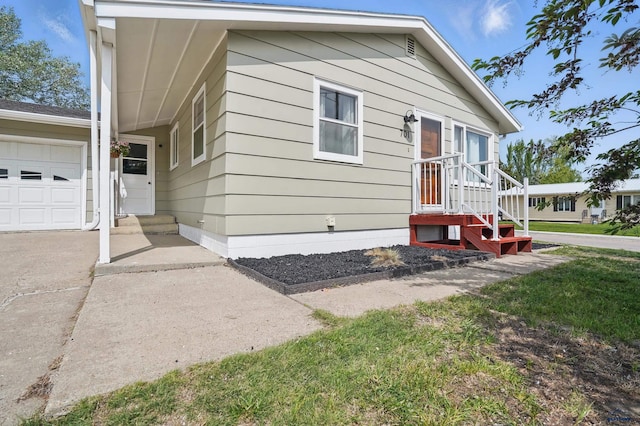 701 Hustead St, Wall, SD 57790 - view of front of property featuring a garage and driveway