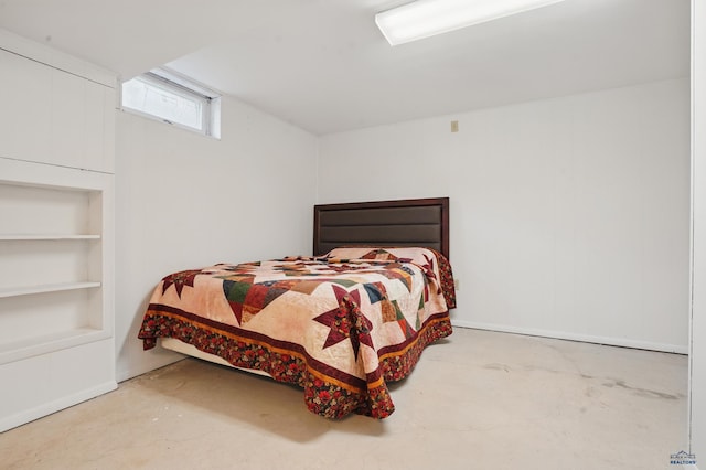 701 Hustead St, Wall, SD 57790 - bedroom with concrete floors and baseboards