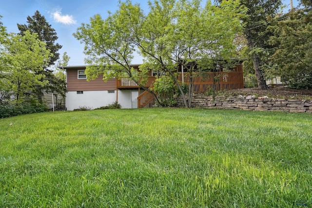 628 Oakland, Rapid City, SD 57701 - view of grassy yard featuring stairway and a wooden deck