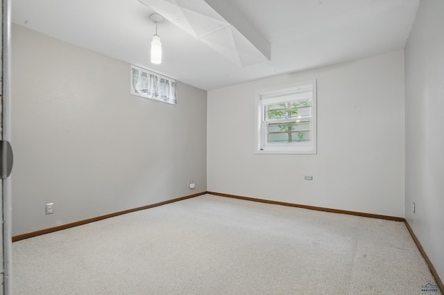 628 Oakland, Rapid City, SD 57701 - spare room featuring carpet and baseboards
