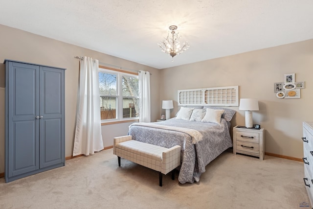 3513 Chapel Valley Rd, Rapid City, SD 57702 - bedroom with light carpet, a chandelier, and baseboards
