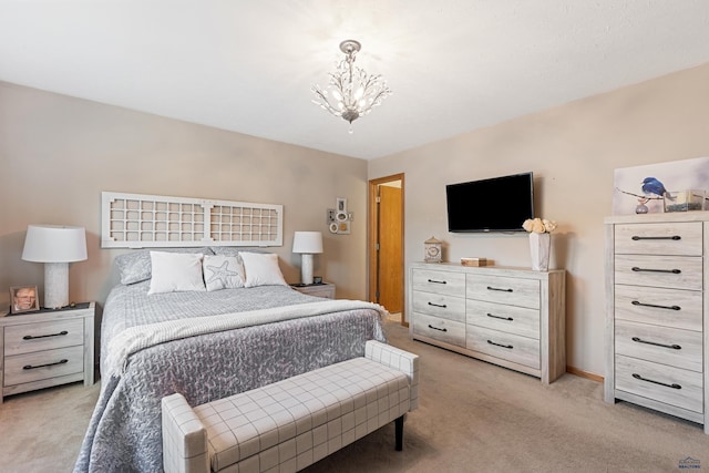 3513 Chapel Valley Rd, Rapid City, SD 57702 - bedroom featuring light carpet and a chandelier