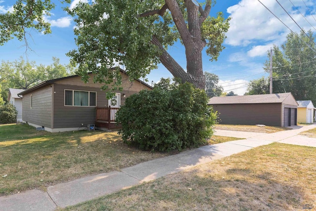 2104 Prairie Ave, Rapid City, SD 57701 - view of front of home featuring a front yard and a garage