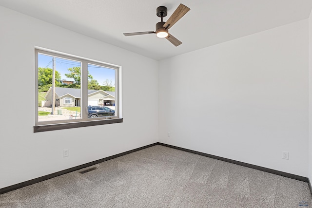 3053 Hoefer Ave, Rapid City, SD 57701 - carpeted empty room featuring ceiling fan and baseboards